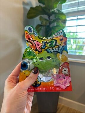 Green Splat Ball Sensory Toy - Fun Squeeze Play